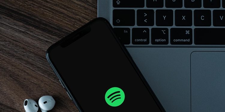 mobile phone, headphones, spotify, smartphone, cellphone, music service, music, social media, entertainment, podcast, laptop, macbook, technology, spotify, spotify, spotify, spotify, spotify