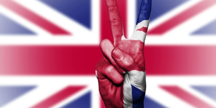 Illustration of a hand showing a peace sign with the UK flag background.