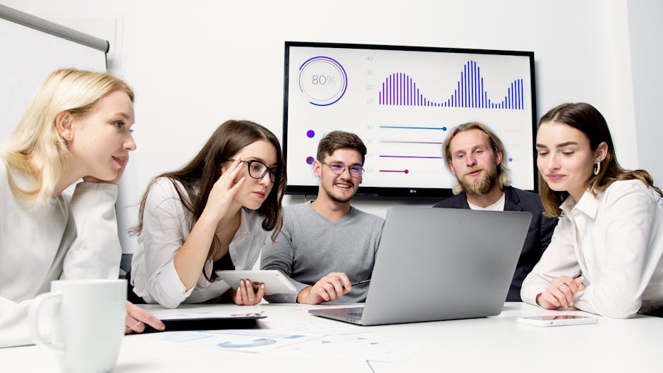 Young professionals collaborating in a creative workspace.