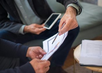 Corporate Crossroads: Adapting to a New Era of Work Amid Economic Tightening and AI’s Ascent