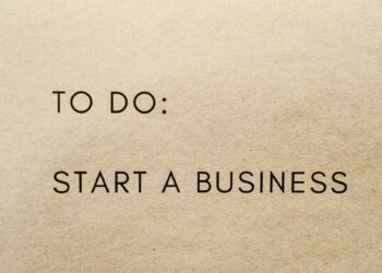 A close-up shot of a to-do list with 'Start a Business' written on it.