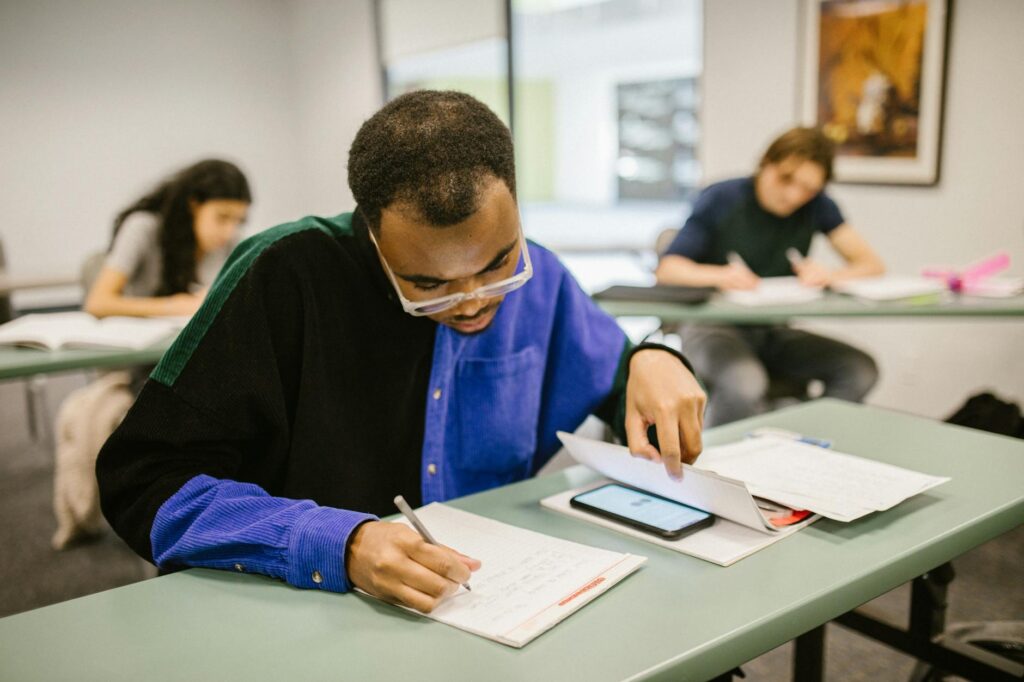 Adaptive Assessments Reshape Competitive Exam Score Distributions and Career Trajectories