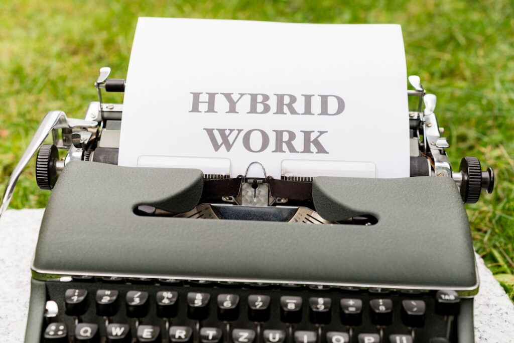 AI‑Enabled Hybrid Workforces and the Structural Shift in Cognitive Wellbeing
