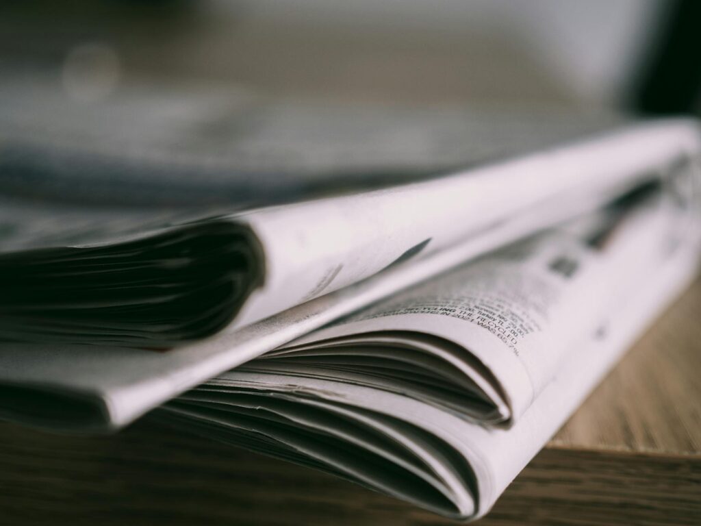 Consolidation’s Quiet Coup: How Media Ownership Shifts Are Reshaping Community Newsrooms and Career Capital