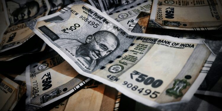 Close-up of Indian rupee notes illustrating abundance and financial concepts.