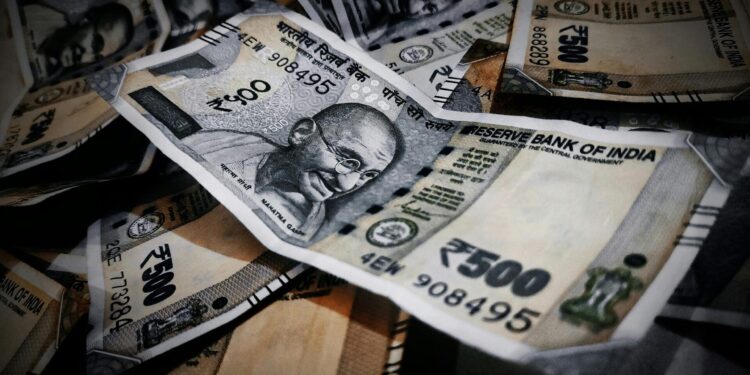 Close-up of Indian rupee notes illustrating abundance and financial concepts.