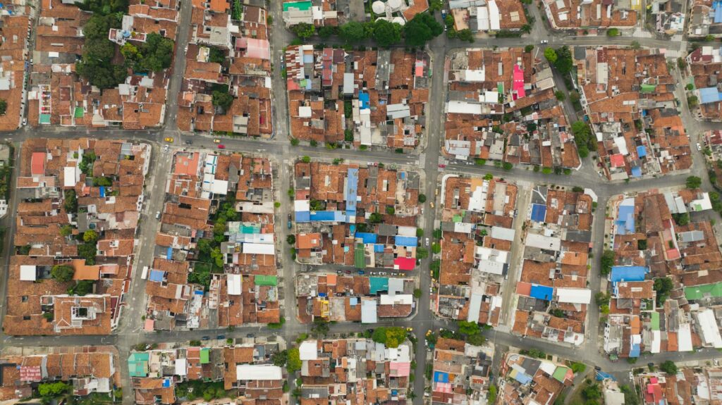 Revitalized Neighborhoods as Engines of Talent Retention: A Systemic Comparison of Urban Renewal Models