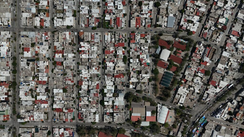 Revitalized Neighborhoods as Engines of Talent Retention: A Systemic Comparison of Urban Renewal Models