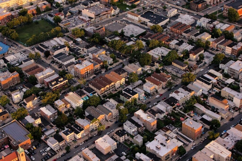 Revitalized Neighborhoods as Engines of Talent Retention: A Systemic Comparison of Urban Renewal Models