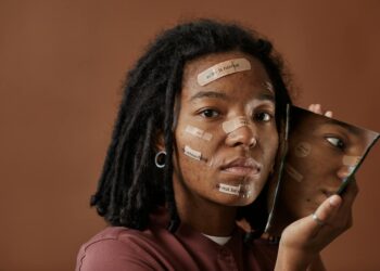 The Cosmetic Capital Curve: How Makeup Shapes Career Mobility for Women of Color