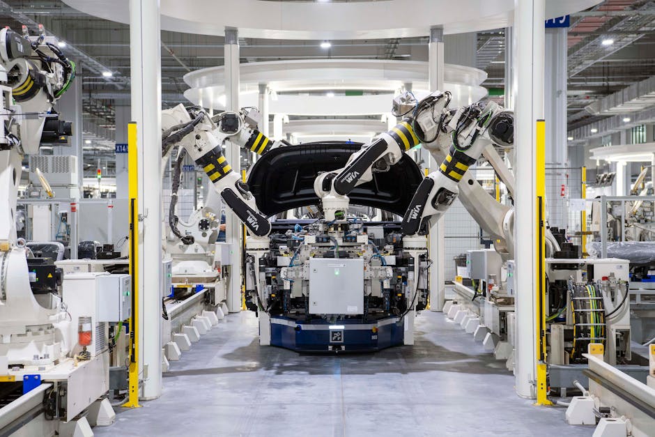 Rivian Scales Back EV Factory Plans Amid Loan Cuts
