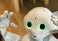 AI‑Mediated Empathy: How “Digital Emotional Intelligence” Is Redefining HR Power and Career Capital