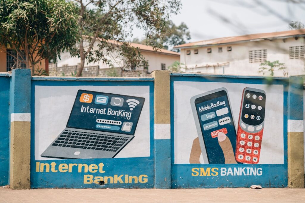 Mobile Wallets as the New Bridge: Systemic Pathways to Financial Inclusion for Underserved Communities