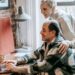 Caregiving Work Undermines Career Advancement at Scale