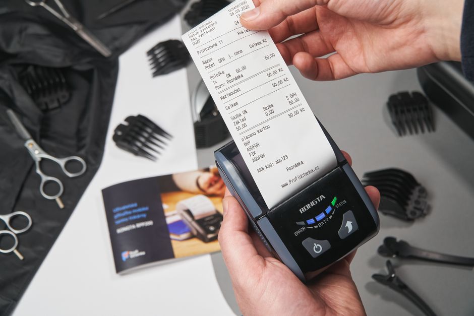 A faceless person pulling money from a cash register, illustrating financial support for the poorest half.