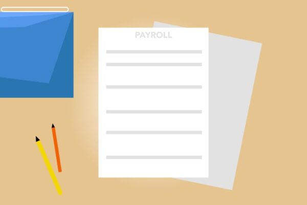 Payroll documents on a beige desk with pencils and a calendar, illustrating the revised IDA rates for CPSE employees.