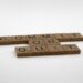 Scrabble tiles spelling “Commit Or Quit” on a white surface, illustrating decision‑making in a new job’s first 90 days.