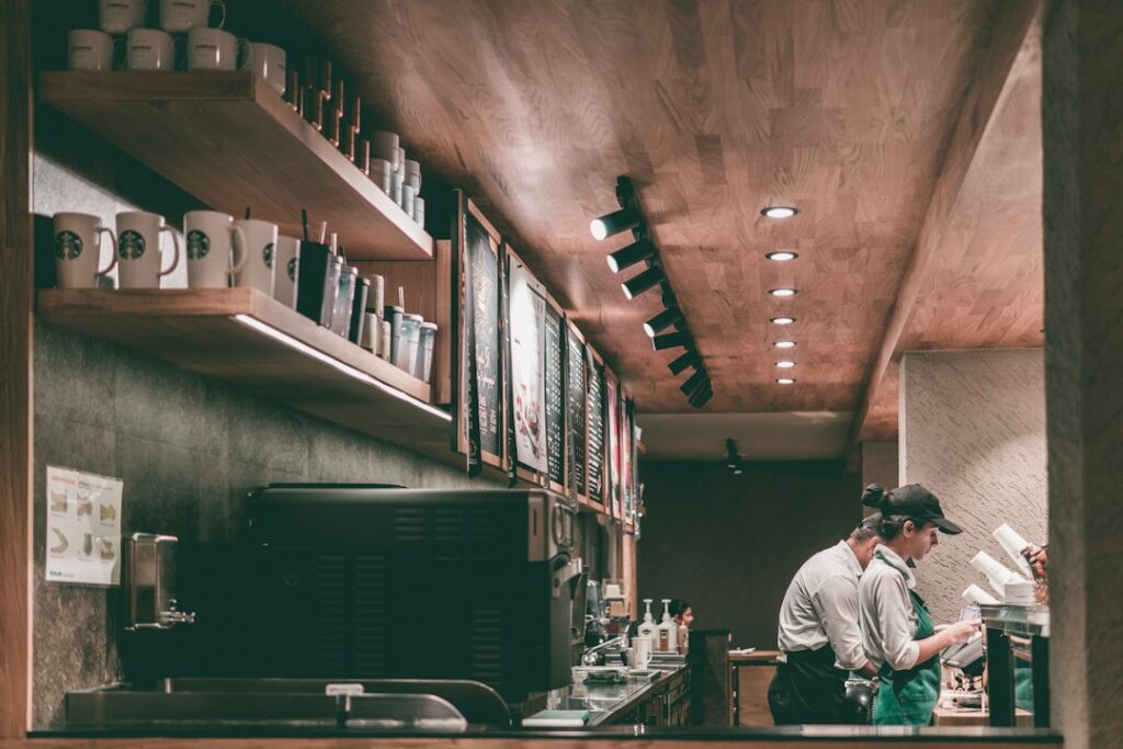 A barista working in a coffee shop, illustrating the Starbucks Q4 store performance article.