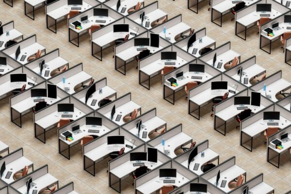 A room filled with desks and computers, illustrating the Microsoft revenue report setting.