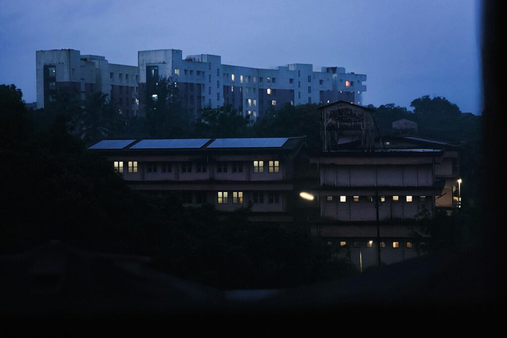 Stock photo of A view of a city at night from a window, used to illustrate this story on UGC Opens Applications for Distance Learning Programs for 2027 Session.