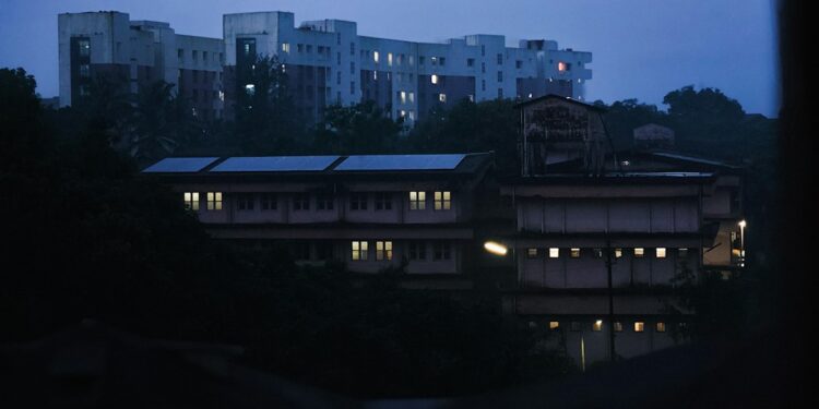 Stock photo of A view of a city at night from a window, used to illustrate this story on UGC Opens Applications for Distance Learning Programs for 2027 Session.