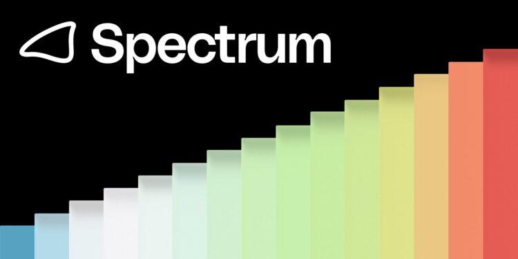 The Photon Spectrum logo in white on a black background above a staircase of colored bars rising from blue to red.